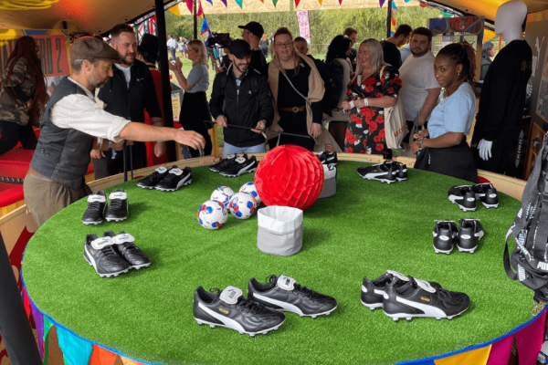 11-min people playing hook a duck with shoes at a puma event